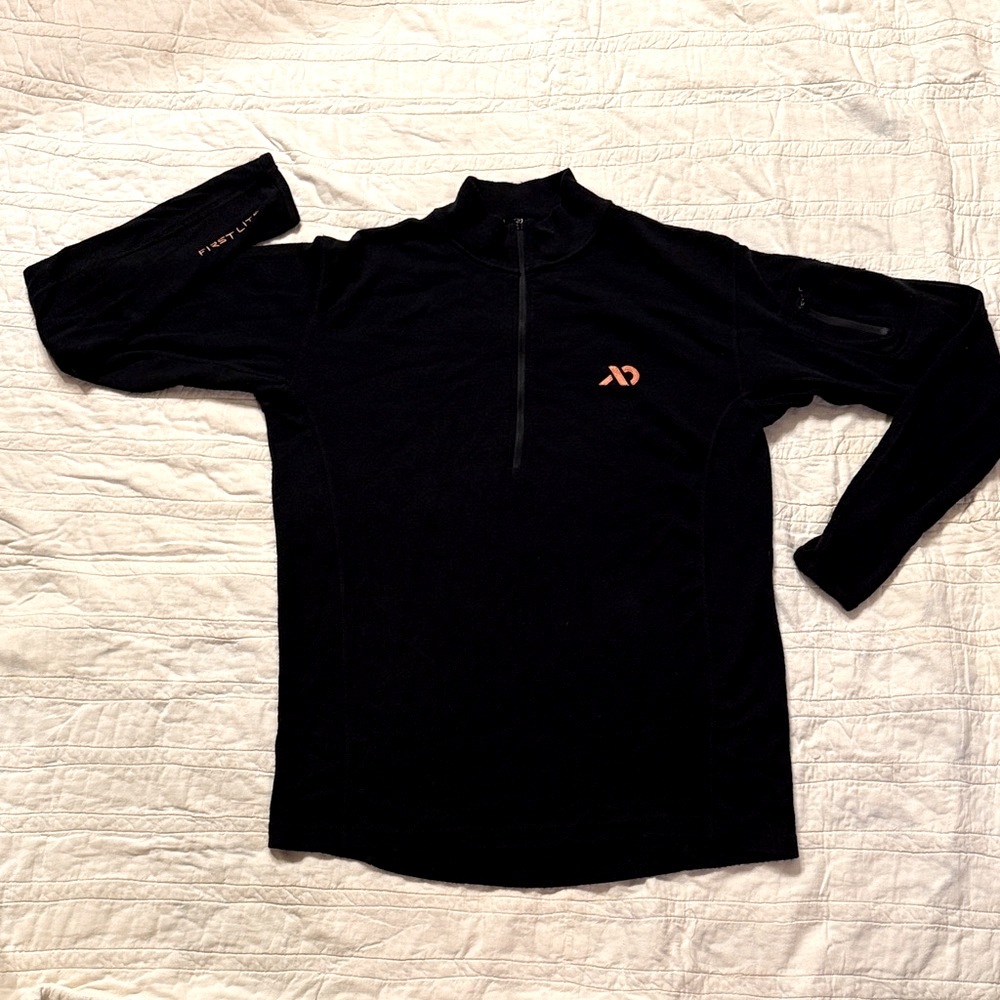 First Lite Black 1/4 Black Zip. 100% Merino Wool, Preowned but like New